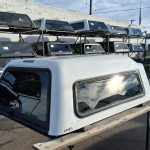 Used white ARE MX Series topper for GMC Sierra 1500 Crew Cab