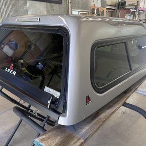 Used Silver Sky LEER 180 topper on a Toyota Tacoma Double Cab