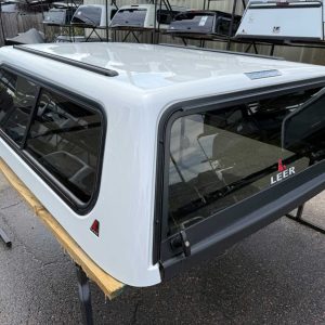 Used white LEER 100XR topper on a Chevrolet Silverado 1500